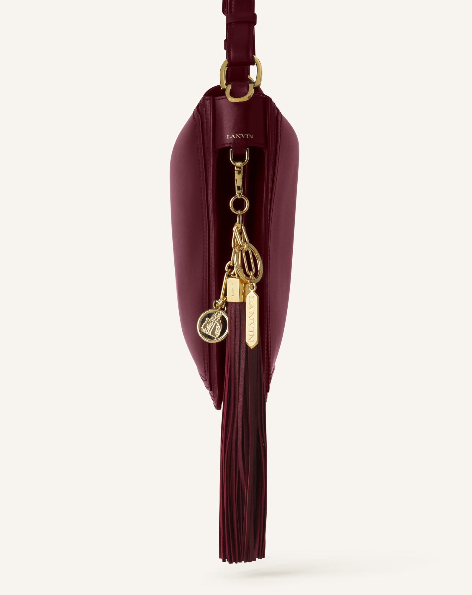 BROWN LARGE LEATHER POMPOM BAG CHARM