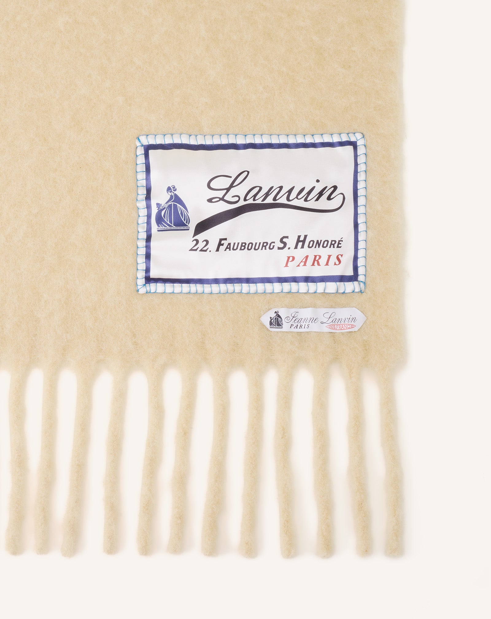 WHITE FRINGED WOOL SCARF WITH 22 FAUBOURG LABEL