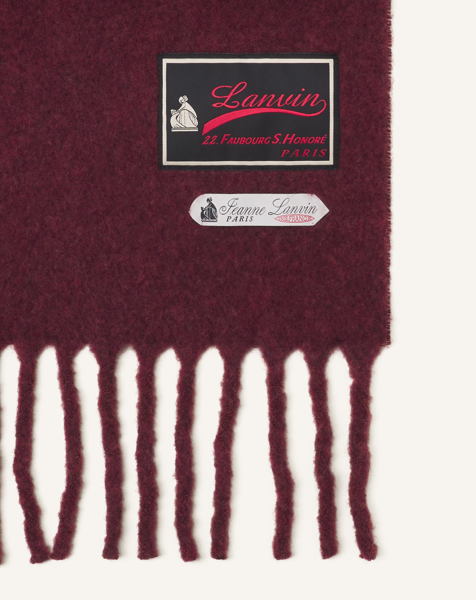 RED FRINGED WOOL SCARF WITH 22 FAUBOURG LABEL