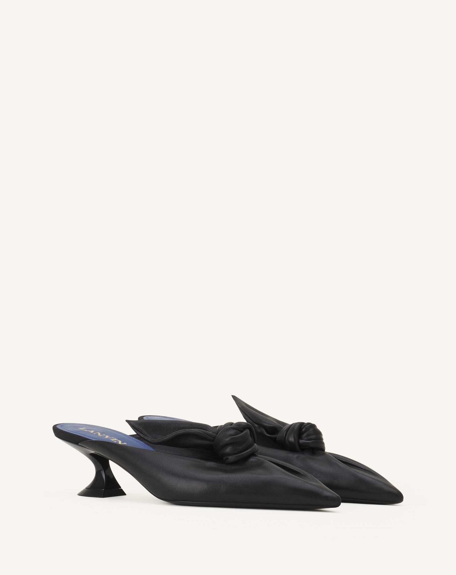BLACK MIDNIGHT STEP HEELED MULES WITH A LEATHER BOW