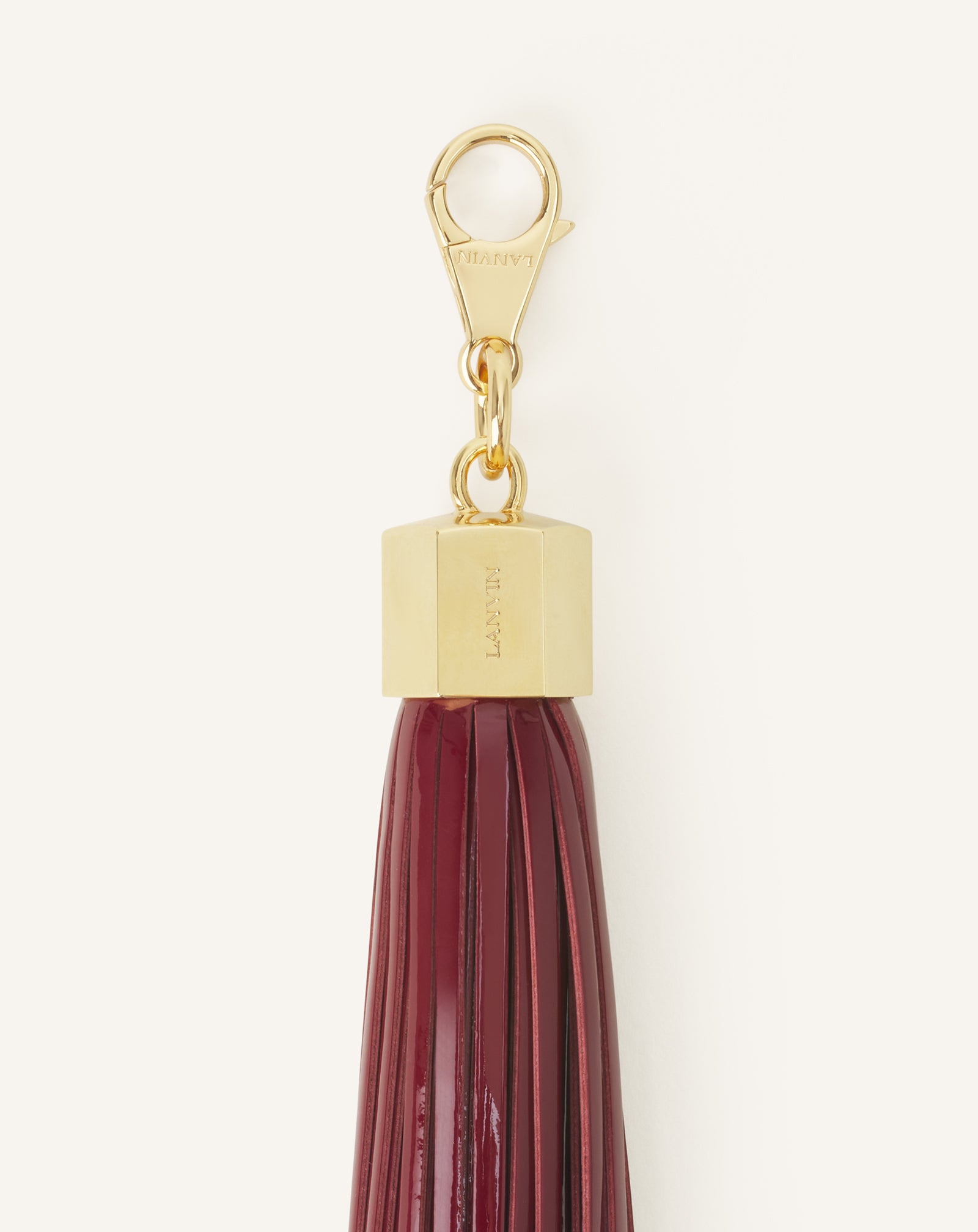 RED LEATHER POMPOM BAG CHARM