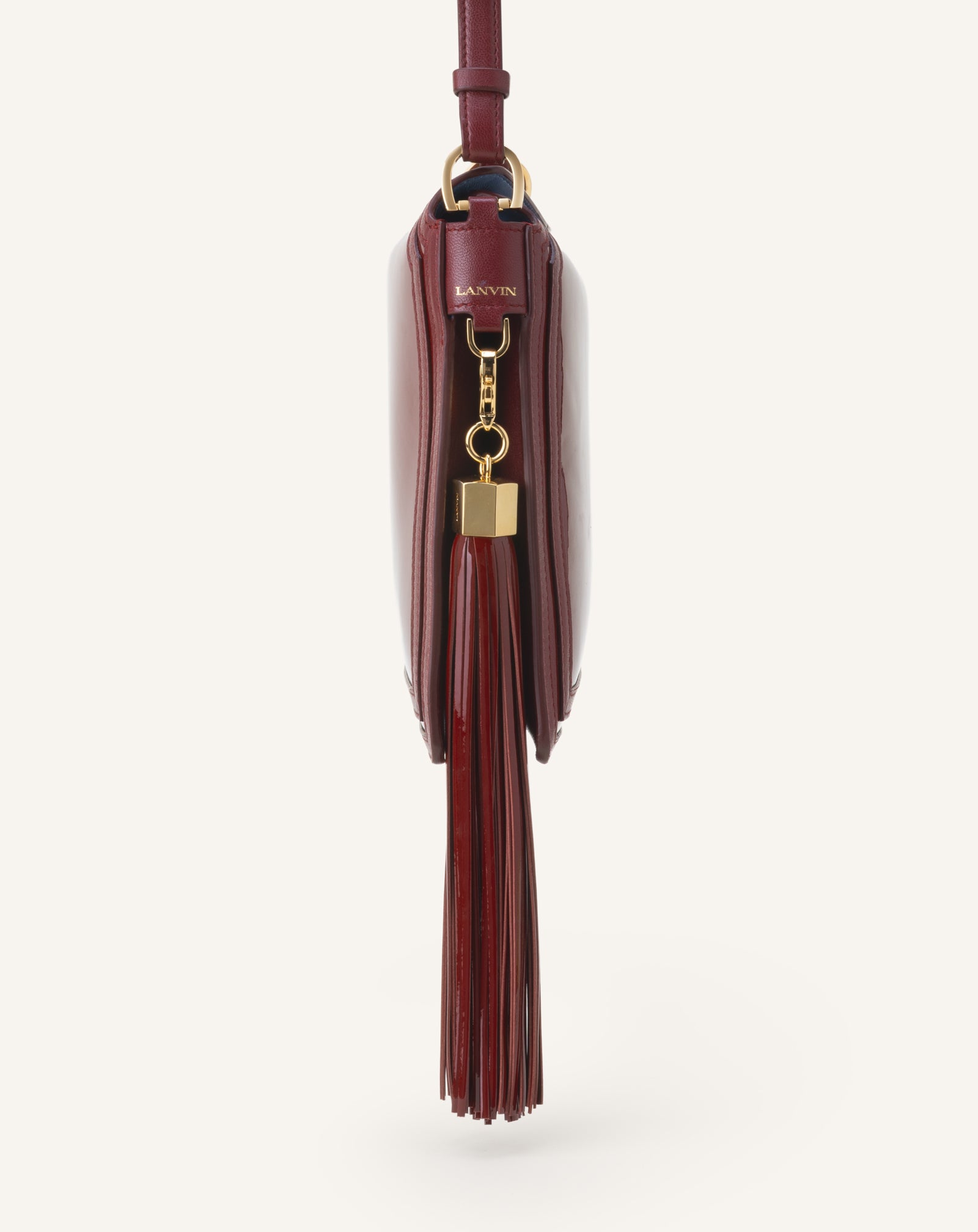 RED LEATHER POMPOM BAG CHARM