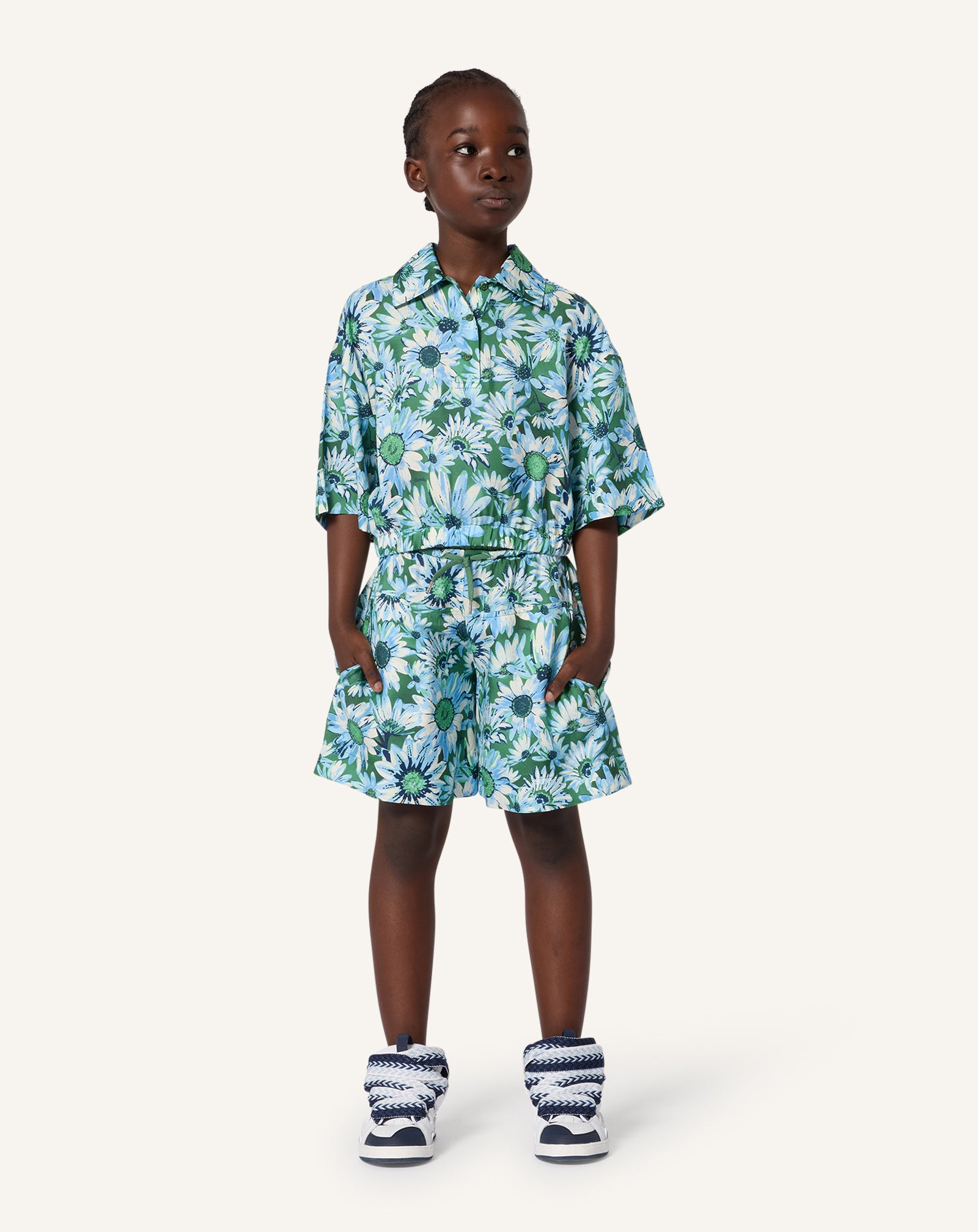 GREEN PRINTED BERMUDA SHORTS