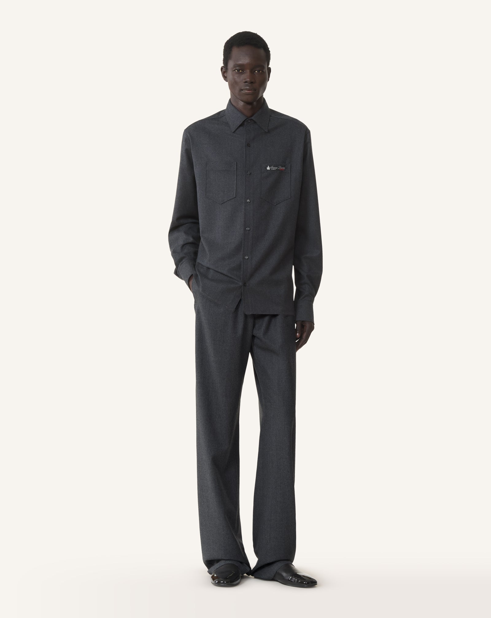 BLACK FLUID WOOL FLANNEL TROUSERS